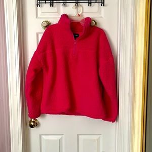 Bright pink polar fleece pullover
